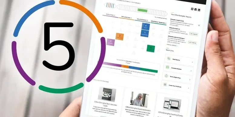 Hand holding a smartphone displaying a website with colorful design elements, including a large number '5'.